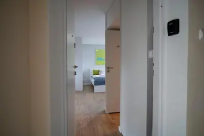 Łóżko lub łóżka w pokoju w obiekcie WLR Apartments - Hoza II