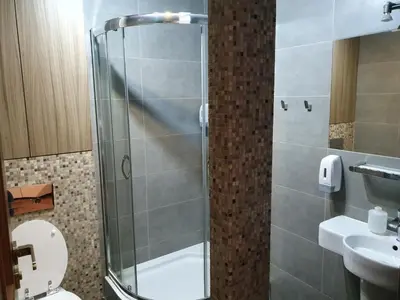 Łazienka w obiekcie Alma Apartments Rondo ONZ