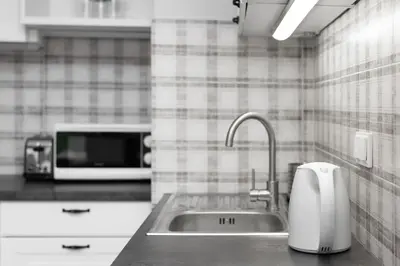 Kuchnia lub aneks kuchenny w obiekcie Apartments Warsaw Obozowa by Noclegi Renters