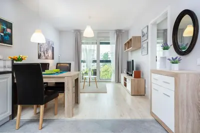 Telewizja i/lub zestaw kina domowego w obiekcie Apartments Warsaw Obozowa by Noclegi Renters