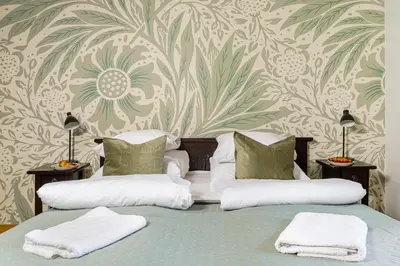 Łóżko lub łóżka w pokoju w obiekcie Miodowa Street P&O Serviced Apartments M3