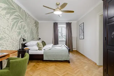 Łóżko lub łóżka w pokoju w obiekcie Miodowa Street P&O Serviced Apartments M3
