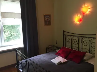 Łóżko lub łóżka w pokoju w obiekcie Apartament PIĘKNA