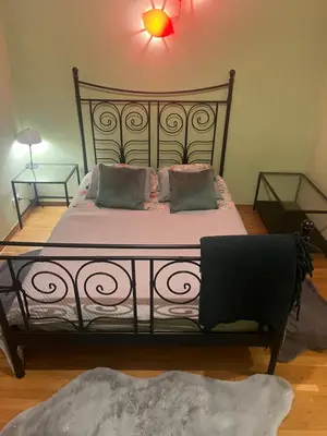 Łóżko lub łóżka w pokoju w obiekcie Apartament PIĘKNA