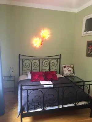 Łóżko lub łóżka w pokoju w obiekcie Apartament PIĘKNA