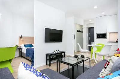 Telewizja i/lub zestaw kina domowego w obiekcie Warsaw City Center Świętokrzyska & Emilii Plater by Noclegi Renters