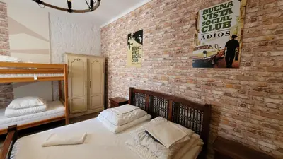 Łóżko lub łóżka w pokoju w obiekcie Chmielna 5 Rooms & Apartments