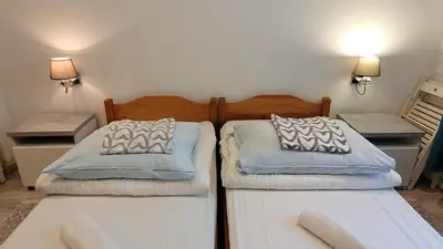Łóżko lub łóżka w pokoju w obiekcie Chmielna 5 Rooms & Apartments