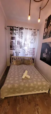 Łóżko lub łóżka w pokoju w obiekcie Chmielna 5 Rooms & Apartments