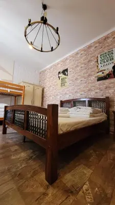 Łóżko lub łóżka w pokoju w obiekcie Chmielna 5 Rooms & Apartments