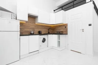 Kuchnia lub aneks kuchenny w obiekcie Apartment Aleje Jerozolimskie 85 by Noclegi Renters