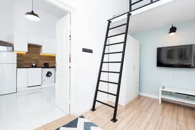 Kuchnia lub aneks kuchenny w obiekcie Apartment Aleje Jerozolimskie 85 by Noclegi Renters