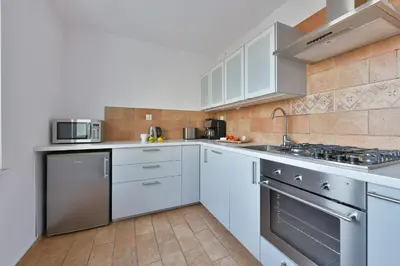 Kuchnia lub aneks kuchenny w obiekcie Medicover Wilanow P&O Serviced Apartments