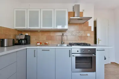 Kuchnia lub aneks kuchenny w obiekcie Medicover Wilanow P&O Serviced Apartments