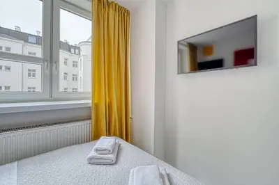 Łóżko lub łóżka w pokoju w obiekcie Level Rooms
