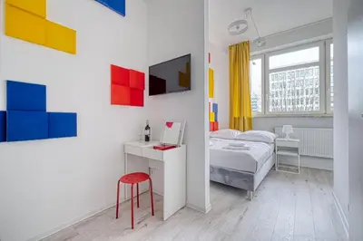 Łóżko lub łóżka w pokoju w obiekcie Level Rooms