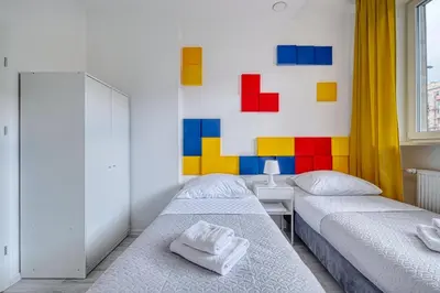 Łóżko lub łóżka w pokoju w obiekcie Level Rooms
