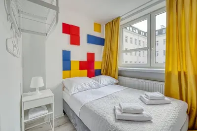 Łóżko lub łóżka w pokoju w obiekcie Level Rooms