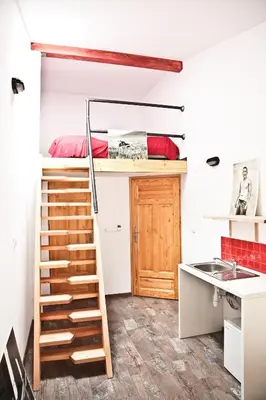 Łóżko lub łóżka w pokoju w obiekcie Szmulson