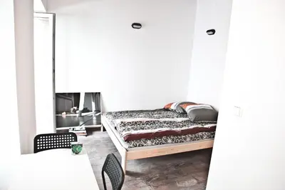 Łóżko lub łóżka w pokoju w obiekcie Szmulson