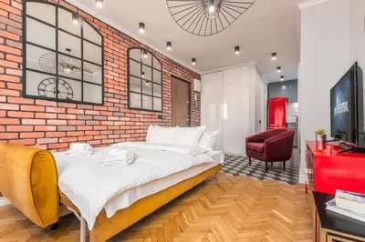 Łóżko lub łóżka w pokoju w obiekcie Apartament Zielna by Your Freedom