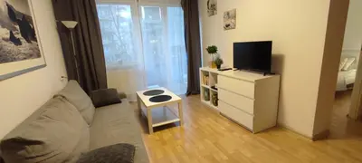 Telewizja i/lub zestaw kina domowego w obiekcie Top Apartamenty Centrum - Metro Rondo ONZ