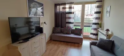 Telewizja i/lub zestaw kina domowego w obiekcie Top Apartamenty Centrum - Metro Rondo ONZ