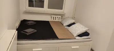 Łóżko lub łóżka w pokoju w obiekcie Top Apartamenty Centrum - Metro Rondo ONZ