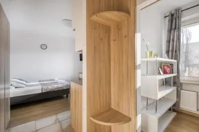 Łóżko lub łóżka w pokoju w obiekcie Labo Apartment Solidarnosci