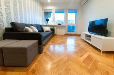 Telewizja i/lub zestaw kina domowego w obiekcie Bielańska Apartment