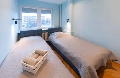 Łóżko lub łóżka w pokoju w obiekcie Bielańska Apartment