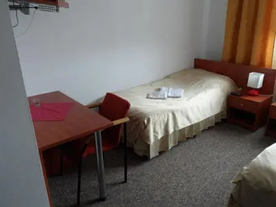 Łóżko lub łóżka w pokoju w obiekcie Hotelik Gold
