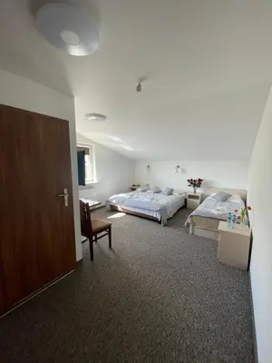 Łóżko lub łóżka w pokoju w obiekcie Hotelik Gold
