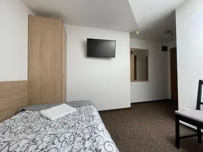 Łóżko lub łóżka w pokoju w obiekcie Hotelik Gold