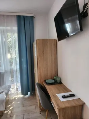 Telewizja i/lub zestaw kina domowego w obiekcie Hostel Mleczna - Metro Zacisze