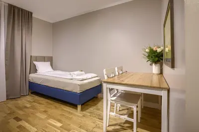 Łóżko lub łóżka w pokoju w obiekcie New! Studio with 3 Beds - Easy Access to Airport, City Center & WUM