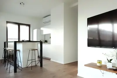Telewizja i/lub zestaw kina domowego w obiekcie Central Port Warsaw Apartment