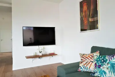 Telewizja i/lub zestaw kina domowego w obiekcie Central Port Warsaw Apartment