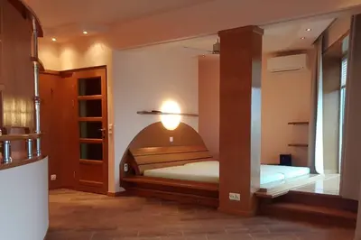 Łóżko lub łóżka w pokoju w obiekcie Apartament Bukowińska