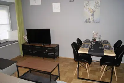 Telewizja i/lub zestaw kina domowego w obiekcie Under Castle Apartment