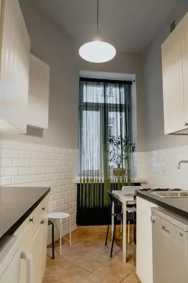 Kuchnia lub aneks kuchenny w obiekcie Warsaw Concierge Chmielna Antresola