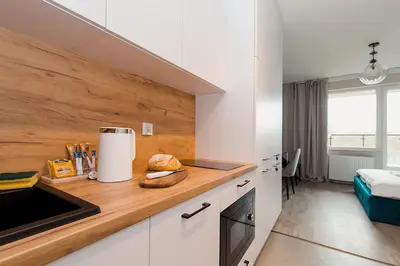 Kuchnia lub aneks kuchenny w obiekcie Warsaw To Be - Silver Apartment