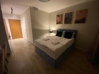 Łóżko lub łóżka w pokoju w obiekcie Warsaw To Be - Easy Apartment