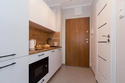 Kuchnia lub aneks kuchenny w obiekcie Warsaw To Be - Easy Apartment