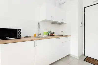 Kuchnia lub aneks kuchenny w obiekcie SuperApart Rydygiera, Pet-friendly with Patio & Self Check-in