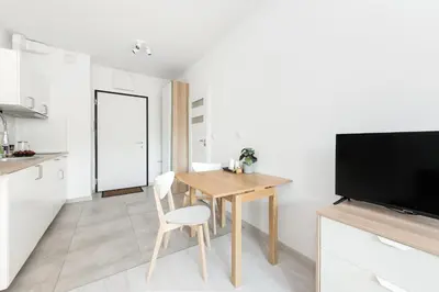Telewizja i/lub zestaw kina domowego w obiekcie SuperApart Rydygiera, Pet-friendly with Patio & Self Check-in