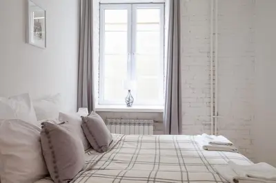 Łóżko lub łóżka w pokoju w obiekcie Ego Apartments Old Town II