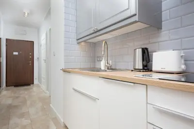 Kuchnia lub aneks kuchenny w obiekcie Apartment Warsaw Żoliborz by Noclegi Renters