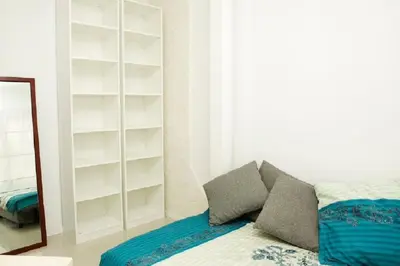 Łóżko lub łóżka w pokoju w obiekcie Wilcza Apartments