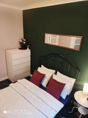 Łóżko lub łóżka w pokoju w obiekcie Apartament Nina